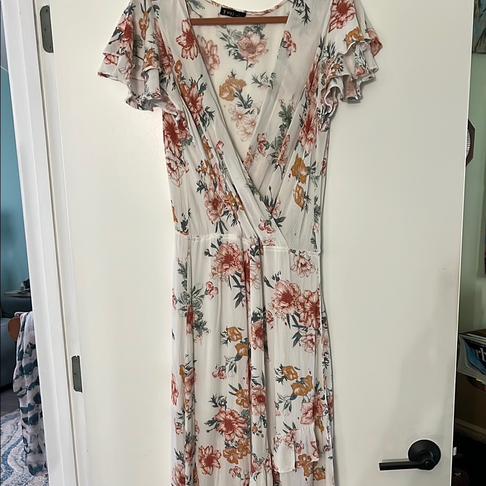 Ruffles and Flowers in this sweet light weight Flowy Dress